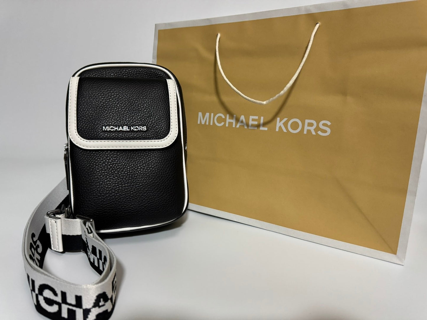 Michael Kors Cooper Medium Two-Tone Sling Pack (Black)